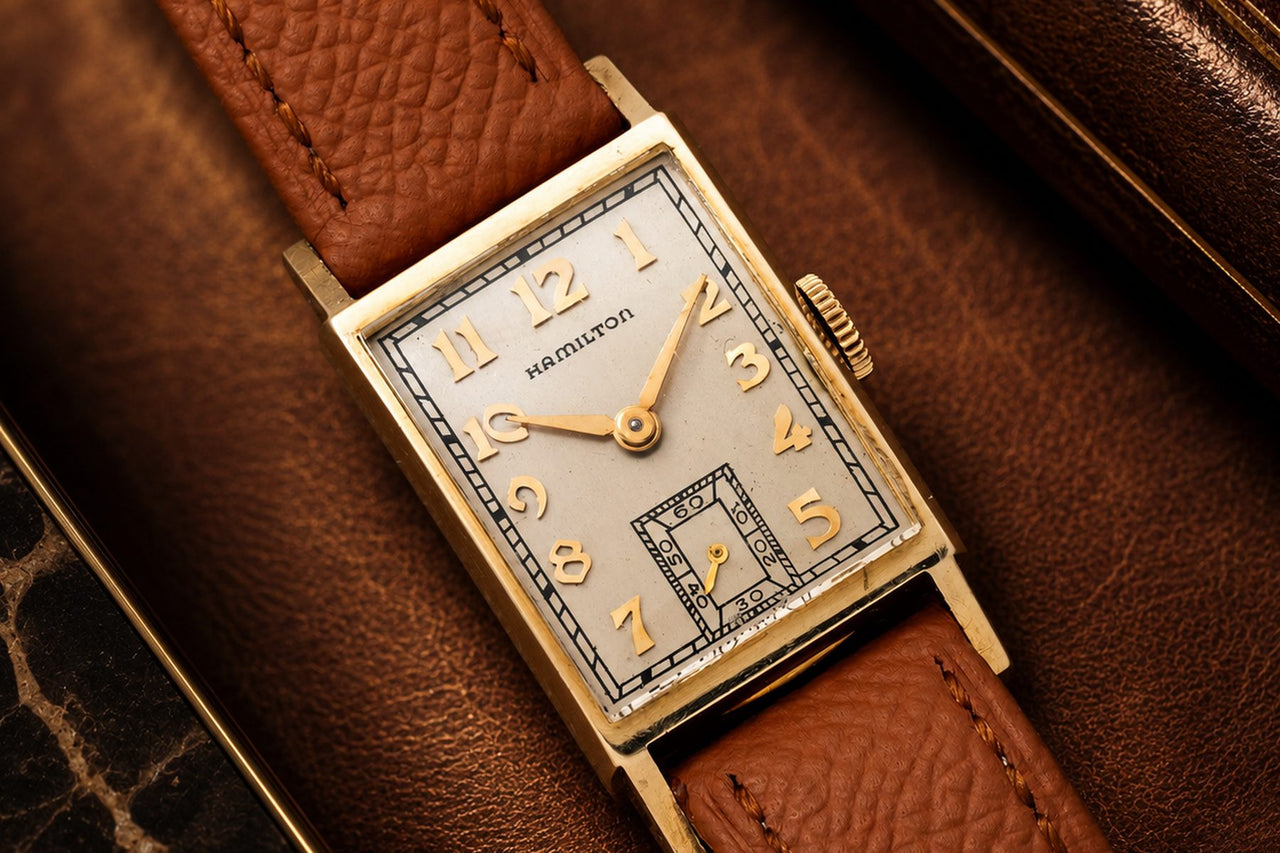 Vintage Hamilton rectangular tank watch with an Art Deco dial on a tan
leather strap